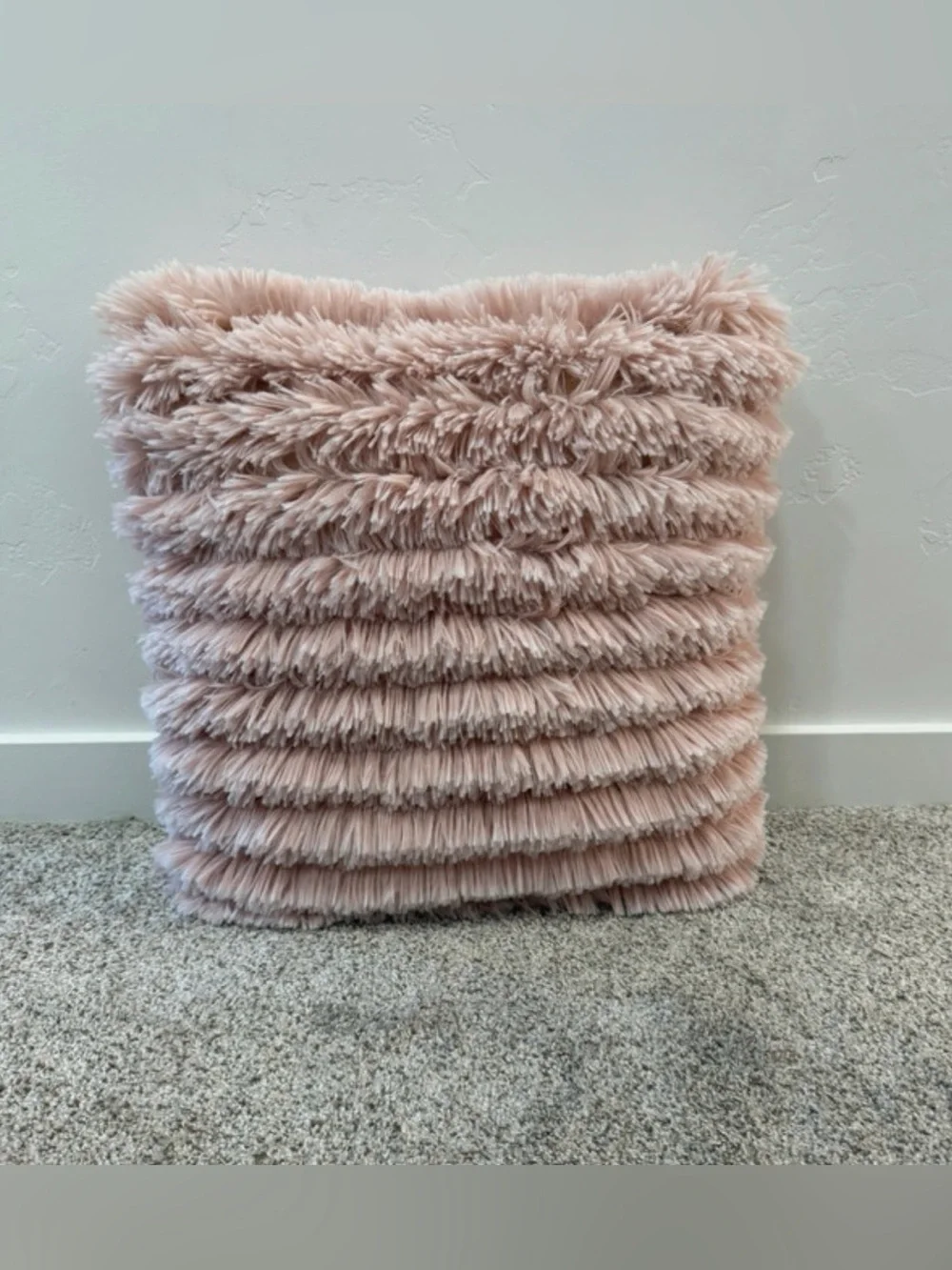 pink fluffy pillow